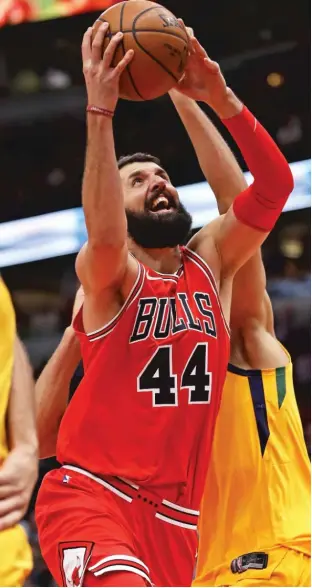  ??  ?? Nikola Mirotic scored a team- high 29 points in the Bulls’ 103- 100 victory over the Jazz. | GETTY IMAGES