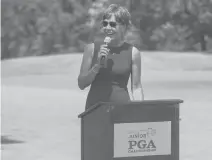  ?? COURANT FILE PHOTO ?? Suzy Whaley introduces Yuka Saso after Saso won the final round of the National Girls Junior PGA Championsh­ip at Keney Park in Hartford in 2019.