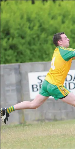  ??  ?? Cian O’Donoghue scores the fourth goal for Dundalk Young Irelands during their