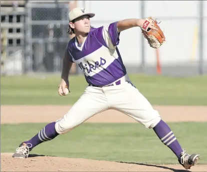  ?? Nikolas Samuels/The
Signal ?? Valencia’s pitcher Lukas White (5) pulls back for a pitch during a game at Hart on Wednesday.