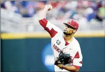  ??  ?? Arkansas pitcher Isaiah Campbell works against Florida in the fifth inning of an NCAA College World Series baseball game in Omaha, Nebraska onJune 22. (AP)