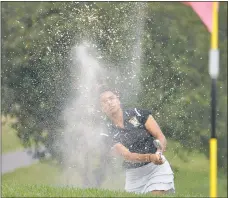  ?? FILE PHOTO BY MICHAEL REID ?? North Point’s Bailey Davis, pictured playing in the 2017 District IV tournament, fired a 71 at Breton Bay Golf and Country Club on Monday to come in with the low round of the tournament.