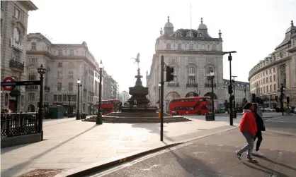  ?? Photograph: David Cliff/NurPhoto/Rex ?? A near-deserted Piccadilly Circus in London, on 8 March 8, 2021.