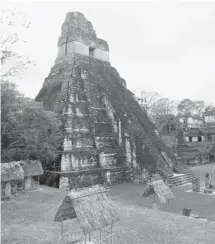  ??  ?? Temple I at Tikal, Guatemala’s largest Mayan ruins park and a UNESCO World Heritage Site, encompasse­s thousands of structures.