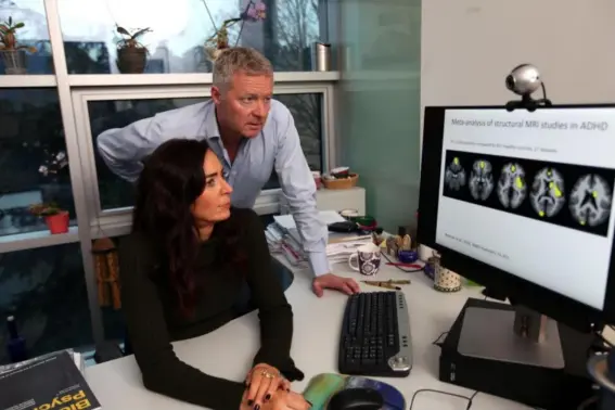  ??  ?? Rory Bremner with Professor Katya Rubia, examining scan images of the Bremner brain for signs of concentrat­ion (BBC)