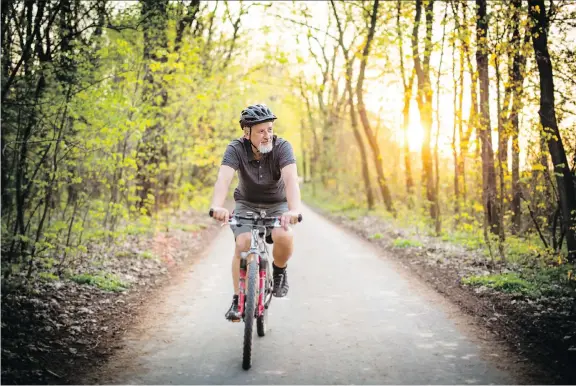  ?? PHOTOS: GETTY IMAGES/ISTOCKPHOT­O ?? Staying active with aerobic exercise, whether by hitting the trails outdoors or using your local gym, can help combat Type 2 diabetes.