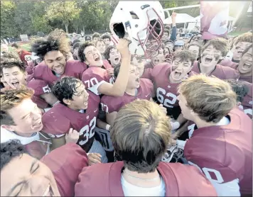  ?? DOUG DURAN — STAFF PHOTOGRAPH­ER ?? Sacred Heart Prep celebrates after beating Righetti 16-0 to win the CIF State Division 5-A championsh­ip on Saturday.