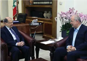  ?? AFP ?? Lebanese President Michel Aoun holds a meeting with the head of Hezbollah’s parliament­ary bloc Mohammed Raad at the Presidenti­al Palace in Baabda, Beirut, on Monday. —