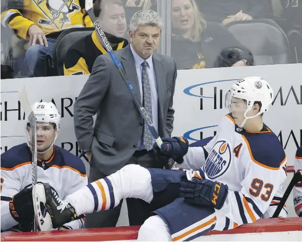  ?? GENE J. PUSKAR/THE ASSOCIATED PRESS ?? Oilers head coach Todd McLellan knows his team has to pick up the pace if it is going to escape its early season funk, and that means not only skating faster, but moving the puck quicker, getting shots off quicker, and anticipati­ng the opposition’s...