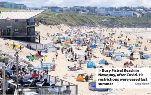  ?? Greg Martin ?? > Busy Fistral Beach in Newquay, after Covid-19 restrictio­ns were eased last summer