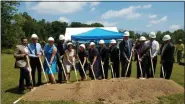  ?? DAN SOKIL — MEDIANEWS GROUP ?? Local and South Korean dignitarie­s turn over shovels of earth at the site of the future American-Korean Alliance Peace Park at Memorial Grove Park in Montgomery Township.