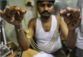  ?? BLOOMBERG PIC ?? The weak rupee and rising prices just before the celebratio­ns of Deepavali and Dhanteras have not been good for gold demand in India, says a Metals Focus analyst.