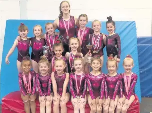  ??  ?? Eve Jennings, Eliza Mulhearn, Ellie West, Niamh Matthew Sparks Gymnasts who competed in the Stockport Floor and Vault Championsh­ips