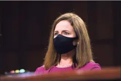  ?? Pool / Getty Images ?? Supreme Court nominee Judge Amy Coney Barrett during the Senate Judiciary Committee confirmati­on hearing in Washington on Monday.