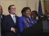  ?? WILL WALDRON/ THE ALBANY TIMES UNION VIA AP, FILE ?? In this Nov. 26 photo, Sen. Andrea Stewart-Cousins laughs with Sen. Michael Gianaris, her new deputy, left, after being named as state Senate majority leader during a news conference at the Capitol in Albany, N.Y.