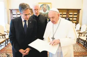  ?? Vatican Media / AFP via Getty Images ?? U.S. Secretary of State Antony Blinken meets with Pope Francis at the Vatican. Blinken thanked Francis for leadership on the need to tackle climate change.