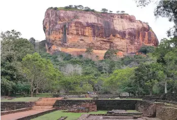  ?? JIM JAMIESON ?? Nearly 200 metres high, the Sigiriya (Lion Rock) is one of Sri Lanka’s eight UNESCO World Heritage sites. A fifthcentu­ry king built his palace on the top and it was a Buddhist monastery until the 14th century.