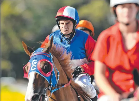  ?? Picture: JUSTIN SANSON ?? Barry Huppatz returns to scale aboard the Gary Clarke-trained It’s Home after the NT News Handicap (1600m) at Fannie Bay yesterday