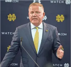  ?? SANTIAGO FLORES, AP ?? Coach Brian Kelly, speaking at a news conference Monday, hired seven new coaches after the Irish’s 4-8 season in 2016.