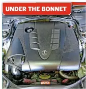  ??  ?? 1 REMOVE ENGINE COVER This being a Mercedes-benz, making the engine look nice and tidy seems to have been one of the major considerat­ions, so you’ll find a plastic engine cover shielding much of the grubby end of things. Fortunatel­y, it just pulls away. Store it somewhere safe where it won’t get damaged.