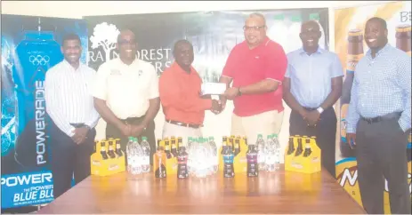  ??  ?? GHB Vice President, Allan Newark (third from right), receiving the sponsorshi­p cheque from Troy Peters, Banks DIH Communicat­ions Manager. Looking on (from left to right) are Banks DIH managers, Errol Nelson, Clive Pellew, Clayton McKenzie and Mortimer...