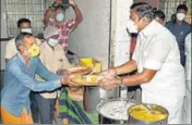  ?? ANI ?? CM Edappadi K Palaniswam­i distributi­ng food packets to needy people during the nationwide lockdown in Chennai on April .