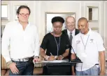  ??  ?? RCL managing director Scott Pitman, the SA Poultry Associatio­n’s Charlotte Nkuna, Fairplay founder Baird Francois and Fawu secretary Katishi Masemola sign a pledge to work together.