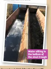  ??  ?? Water si ing in the bo om of the steel trough