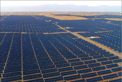  ?? PROVIDED TO CHINA DAILY ?? Capitalizi­ng solar and thermal energies in the Kubuqi Desert, Elion develops an ecological photovolta­ic industry. It integrates desertific­ation control, power generation, plantation­s, animal husbandry and poverty alleviatio­n.