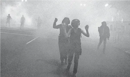  ?? BETH NAKAMURA/ AP ?? Protesters gather during a demonstrat­ion in Portland, Ore., on Thursday.