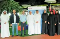  ?? Supplied photo ?? Senior KHDA officials with the residents who presented their ideas at the Smart Majlis session. —