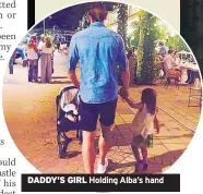  ??  ?? DADDY’S GIRL Holding Alba’s hand