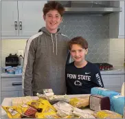  ?? SUBMITTED PHOTO ?? Ari (left) and Tyler Jaffe prepare to make edible cookie dough for their American Cancer Society fundraiser.