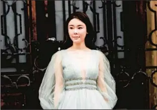  ?? SIPA USA VIA AP ?? Model and influencer Abby Choi, last seen Tuesday, at a January fashion show in Paris. Parts of the 28-year-old’s body were found in a Hong Kong rental unit, leading to the arrests of her former husband’s parents and brother, then, lastly, the ex Saturday afternoon.