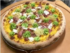  ??  ?? Sa pizza est classée huitième à Rome dans la catégorie « Sapori del Sud »