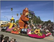  ?? MICHAEL OWEN BAKER — THE ASSOCIATED PRESS ?? The Shriners Hospitals for Children float travels along the 131st Rose Parade route in Pasadena on Wednesday.