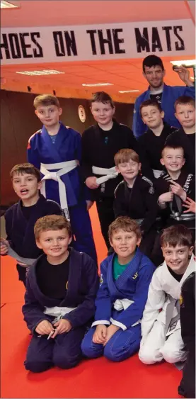  ??  ?? Brian Kelly, Dean Barry and some of the students of Arnkell Jiu Jitsu Academy w