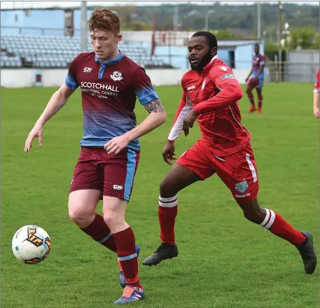  ??  ?? Drogheda United’s Sean Cronin is chased by Mick Zingo of Shelbourne during Saturday’s Under-19 clash.