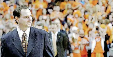  ?? ARCHIVES] ?? OSU head coach Sean Sutton smiles as he walks onto the court before a 2006 exhibition game against Pittsburg State at Gallagher-Iba Arena. Sutton faces the Cowboys as a Gallagher-Iba Arena visitor for the first time Wednesday.[OKLAHOMAN