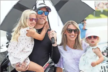  ?? Matthew oharen-uSa Today Sports ?? NASCAR Cup Series driver Brad Keselowski along with his wife Paige and children Scarlett and Autumn stand on pit road prior to the Explore the Pocono Mountains 350 at Pocono Raceway.