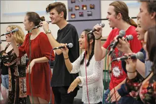  ?? Katharine Lotze/The Signal ?? The Valencia High School Choir practices on Friday ahead of a performanc­e at the Monterrey Jazz Festival on Sunday.