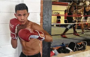  ?? Peter Lim ?? Undefeated Houston featherwei­ght Miguel Flores (21-0, 9 KOs) hopes a world title shot will be waiting, should he beat Dat Nguyen (19-3, 6 KOs) in a 10-round fight on Tuesday night at Silver Street Studios.