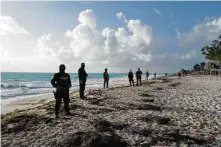  ?? ?? Mexican security forces oversee the destructio­n of an illegal establishm­ent used by drug dealers on the outskirts of Cancún.