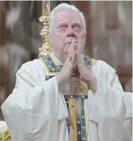  ?? AP FILE PHOTO ?? JUDGMENT DAY: Cardinal Bernard Law prays in Rome during a 2011 Mass. The former head of the Archdioces­e of Boston died Tuesday at the age of 86.