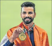  ?? PTI ?? Arpinder Singh at the men's triple jump medal ceremony.