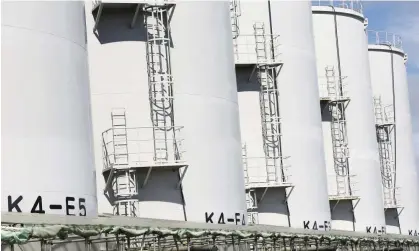  ?? 24 August. Photograph: Rodrigo Reyes Marin/ZUMA Press Wire/Shuttersto­ck ?? Treated water storage tanks at the Fukushima Daiichi nuclear power plant. Japan began its release of the more than 1m tonnes of water on