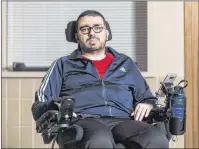  ?? CP PHOTO ?? Aymen Derbali poses for a photo in Quebec City on Wednesday, December 27, 2017. A fundraiser to find a new home for a man who lost use of his legs in last year’s Quebec City mosque shooting has reached its $400,000 goal.