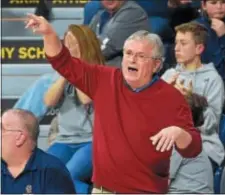  ?? PETE BANNAN — DIGITAL FIRST MEDIA ?? Cardinal O’Hara coach Linus McGinty, in a surprising­ly mild moment, starts the celebratio­n as his Lions pull away from Neumann-Goretti down the stretch Monday night en route to a championsh­ip.