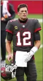  ?? KEVIN SABITUS — AP, FILE ?? Buccaneers quarterbac­k Tom Brady looks on prior to a Jan. 3game against the Falcons in Tampa, Fla.