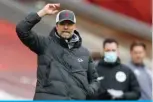  ?? — AFP ?? LIVERPOOL: Liverpool’s German manager Jurgen Klopp shouts instructio­ns to his players from the touchline during the English Premier League football match between Liverpool and Aston Villa at Anfield in Liverpool, north west England on Saturday.